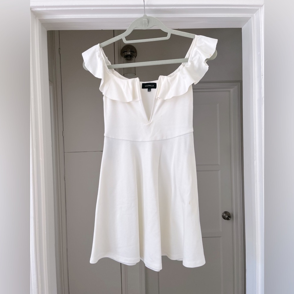 Majorelle White ruffle dress.